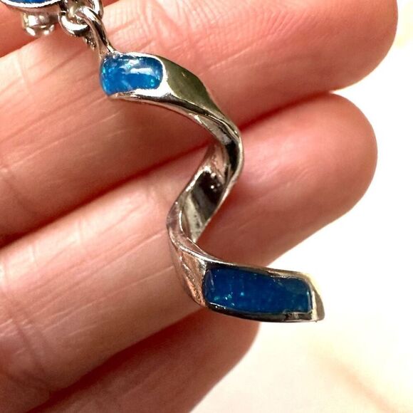 Silver tone swirl blue inlay earrings - Picture 6 of 7